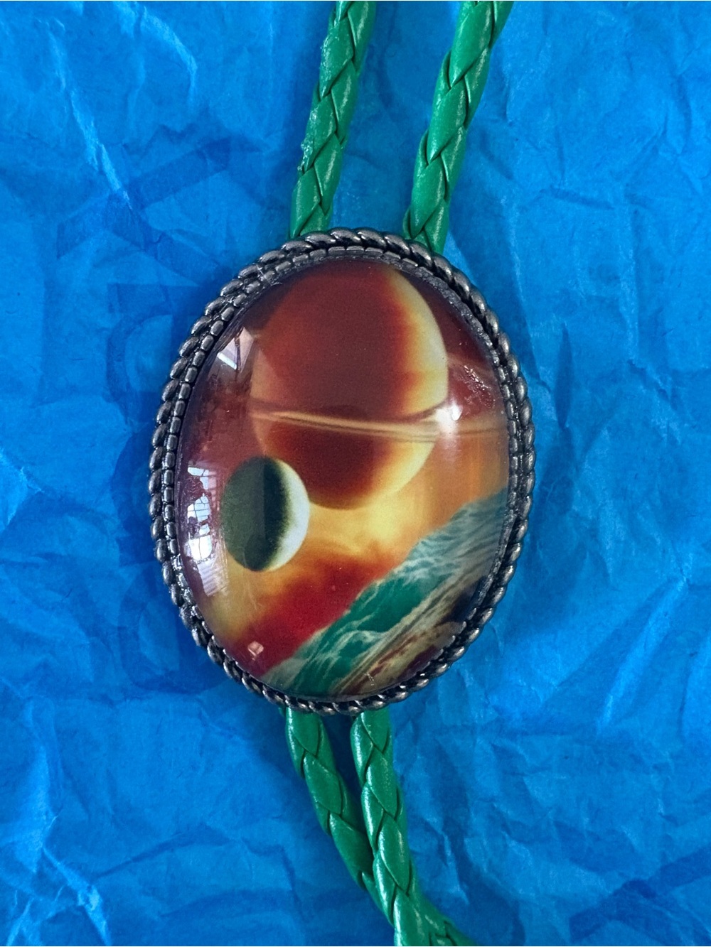 Green Bolo Tie with Orange Planet Cabochon
